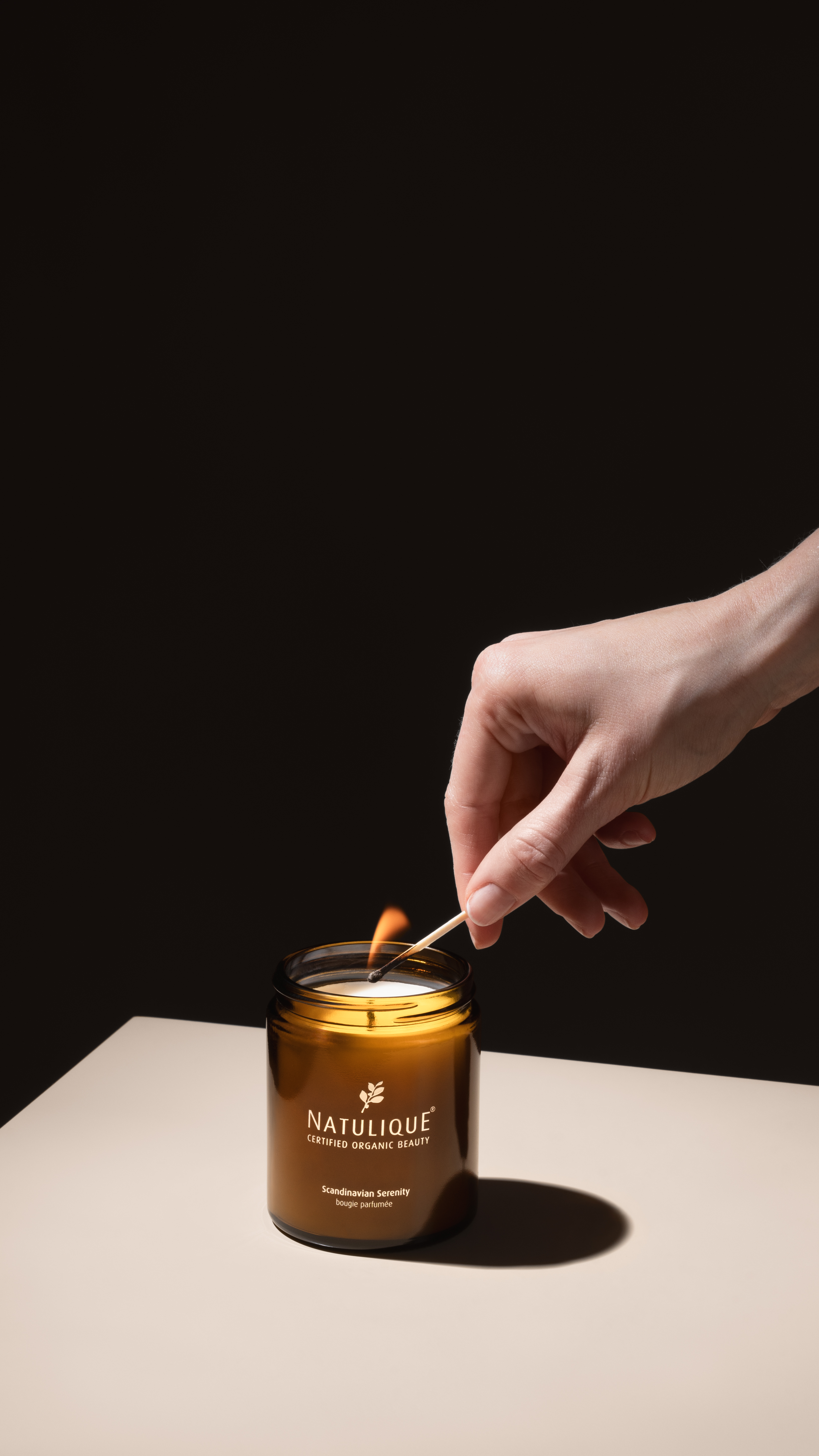 Lighting a scented candle for the Natulique head spa experience