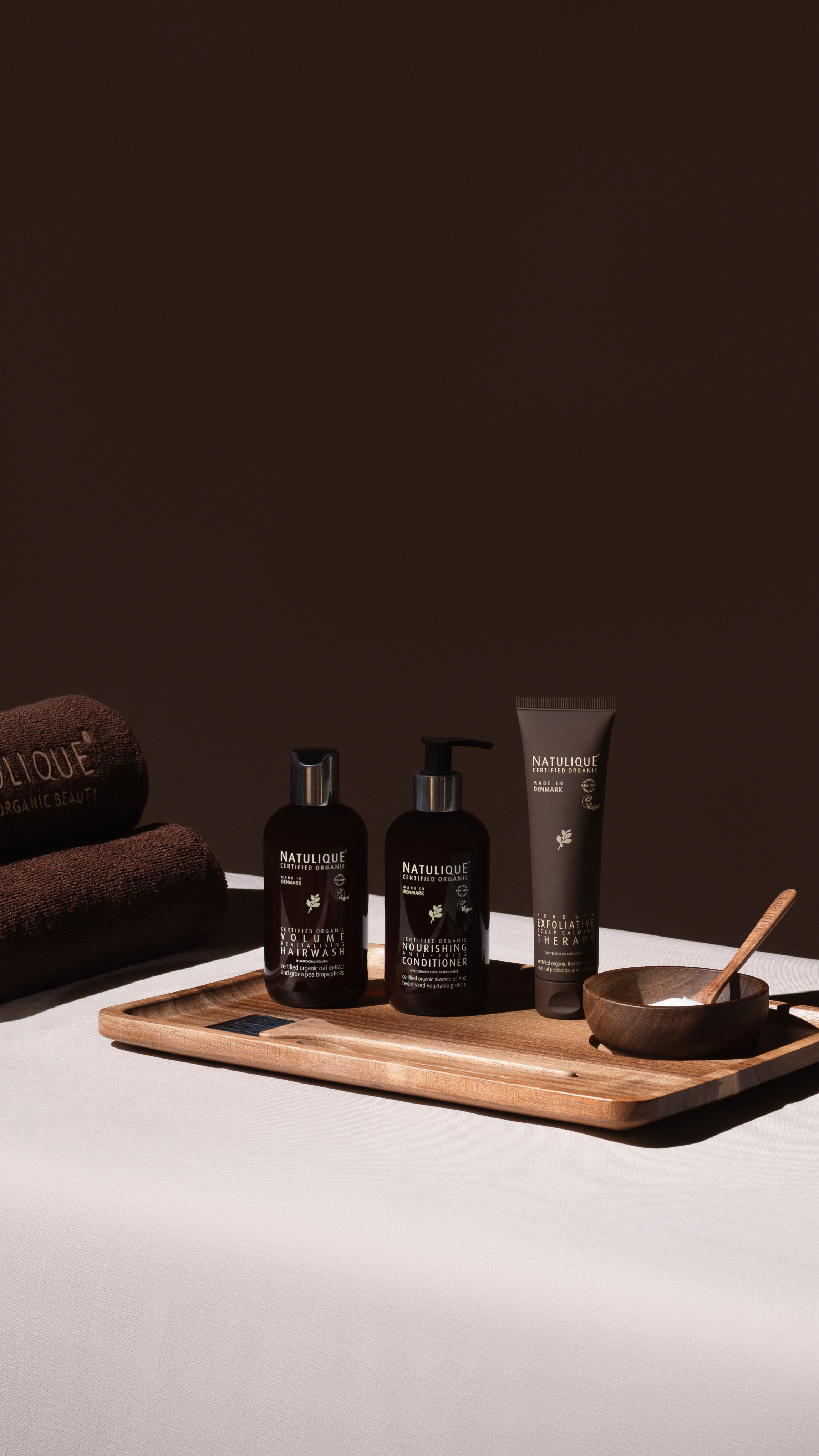 Natulique certified organic volume hair wash, nourishing conditioner and exfoliative therapy products